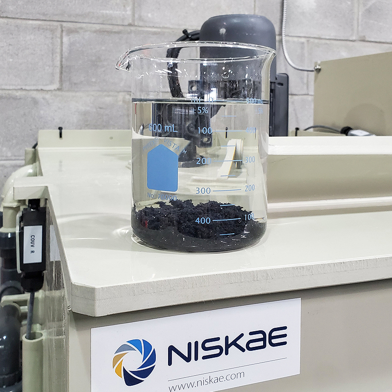 Flocculation beaker test for the treatment of printing ink wash water